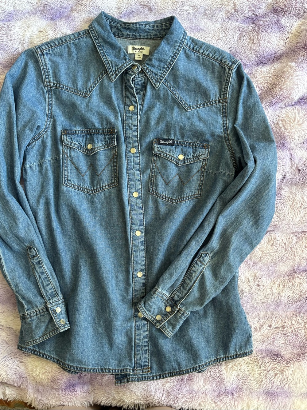 Wrangler - medium wash denim. Pearl snap button down